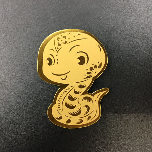 Gold phone sticker with the Chinese zodiac sign of snake