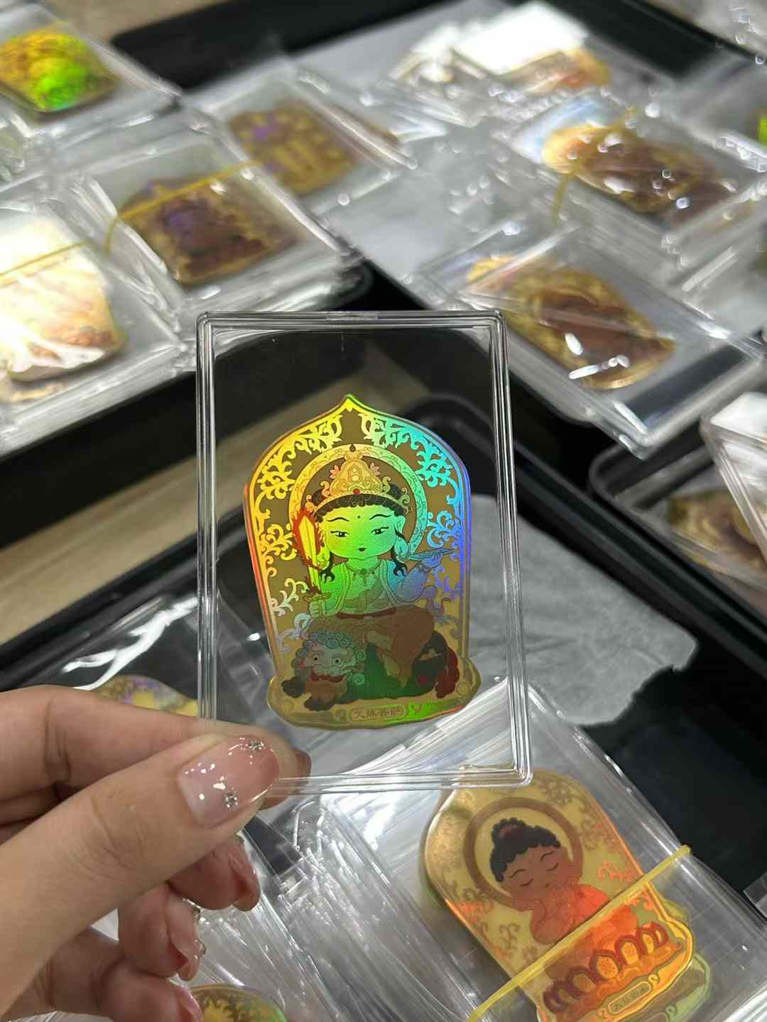 Gold phone sticker with Mahasthamaprapta Bodhisattva [Guardian of the Horse]
