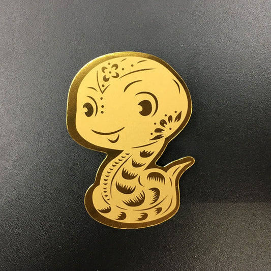 Gold phone sticker with the Chinese zodiac sign of snake